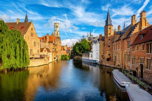 rozenhoedkaai canal-belfry-bruges-belgium-shutterstock_1214277007